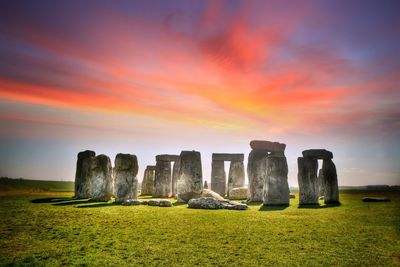 Stonehenge against sky during sunset