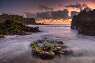 Scenic view of sea against sky during sunset