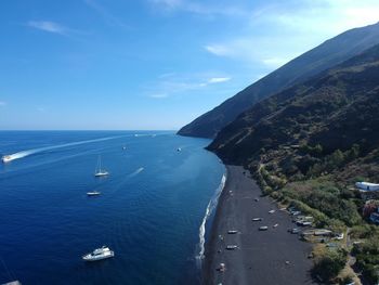 Scenic view of sea against blue sky