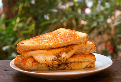 Close-up of bread in plate on table