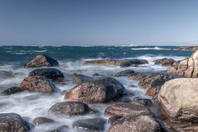 Scenic view of sea against clear sky