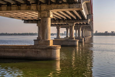 Central bridge in the city of dnipro, ukraine, on a sunny summer morning