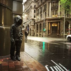 Woman standing in city