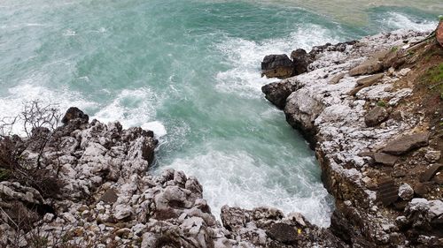 Scenic view of rocks in sea