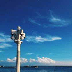 Scenic view of sea against blue sky