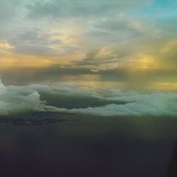 Scenic view of sea against dramatic sky