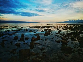 Scenic view of sea at sunset