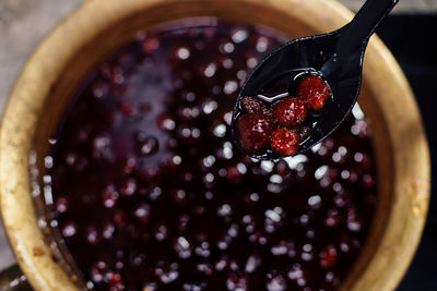 High angle view of berries in bowl