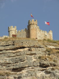 Low angle view of fort against sky
