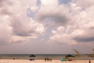 Scenic view of sea against cloudy sky