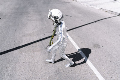 High angle view of person standing on road