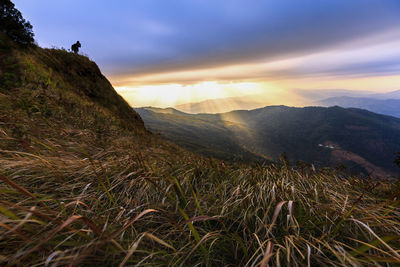 Scenic view of mountains against sky during sunset