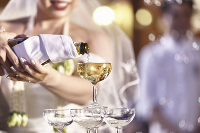 Close-up of woman drinking glasses