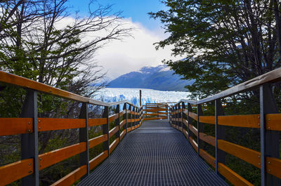 Wooden walkway with mountain in background