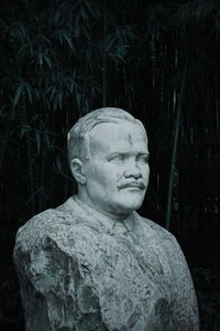 Close-up of buddha statue in park