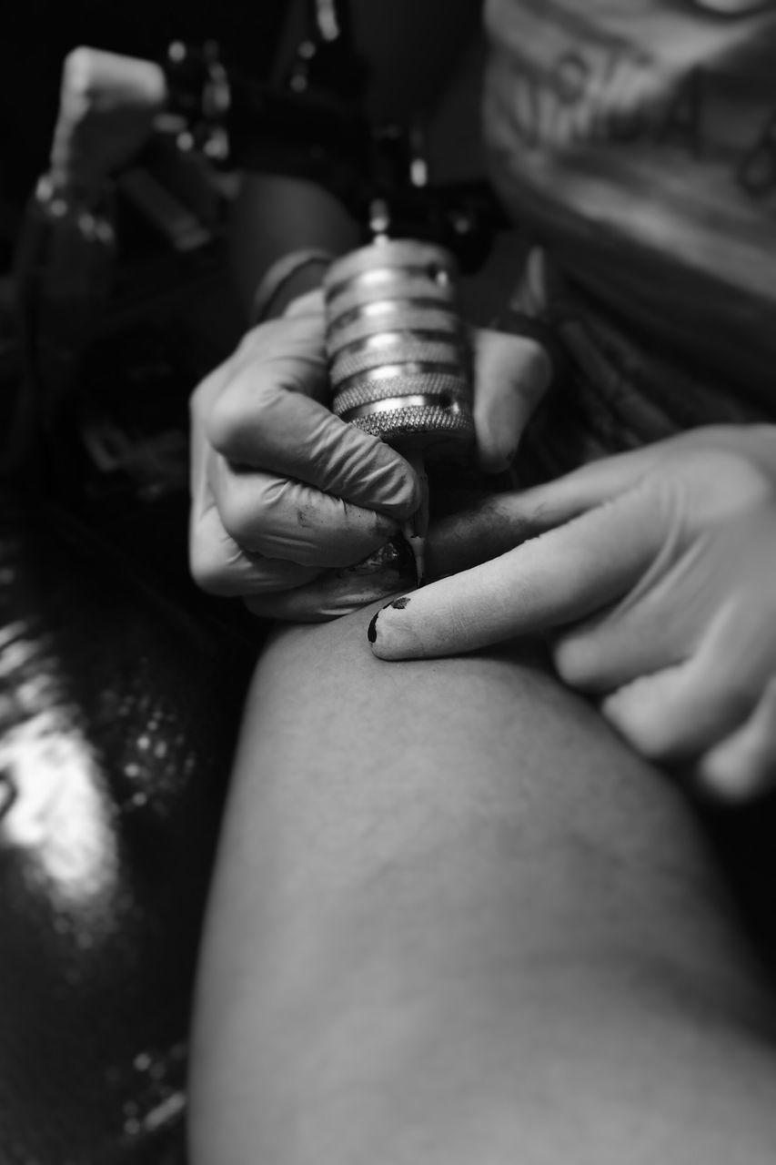 indoors, person, part of, holding, cropped, human finger, close-up, selective focus, men, lifestyles, focus on foreground, midsection, unrecognizable person, leisure activity, working, technology
