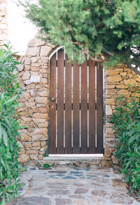 Closed door of stone wall