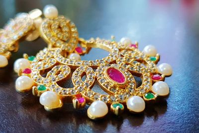 Close-up of jewelry on table