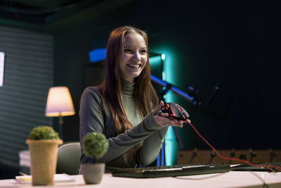 Young woman playing guitar