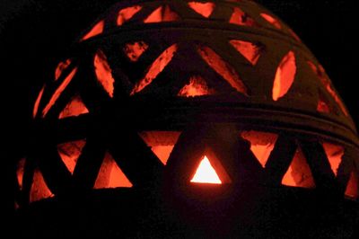 Close-up of illuminated orange pumpkin