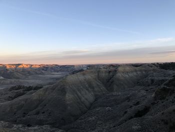 Scenic view of landscape against sky during sunset