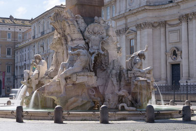 Statue of historic building in city