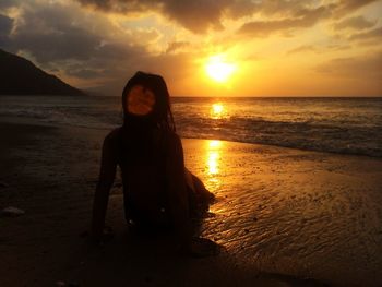 Scenic view of sea at sunset