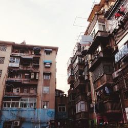 Low angle view of buildings against sky