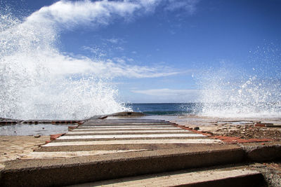 Sea waves splashing on shore