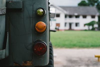 Close-up of vehicle on field