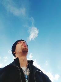 Low angle view of a man against sky