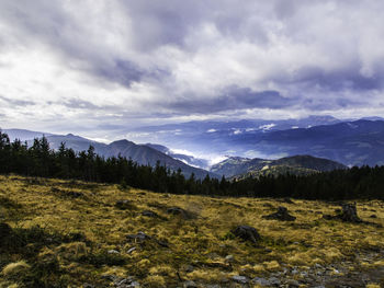 View of mountains against cloudy sky