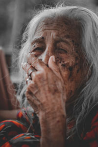 Close-up of old woman