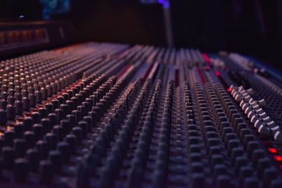 Close-up of sound mixer at music concert