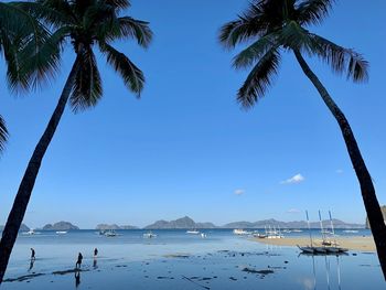 Scenic view of sea against blue sky