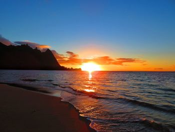 Scenic view of sea against sky during sunset