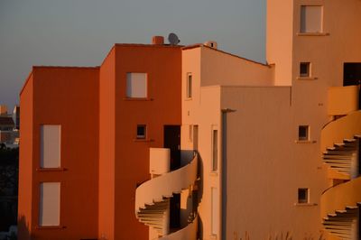 Buildings against clear sky