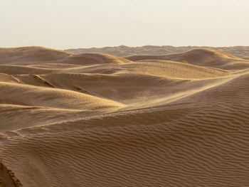 Scenic view of desert against sky