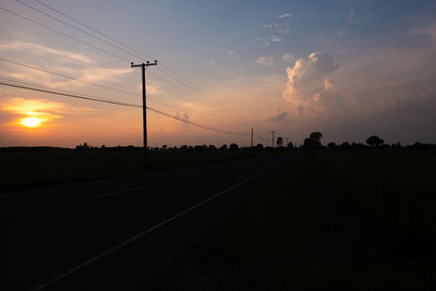 Silhouette landscape against sky during sunset