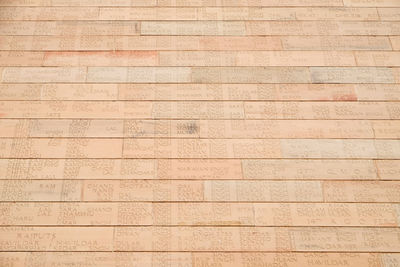 Engraved name of the soldiers on the bricks of india gate, delhi, india