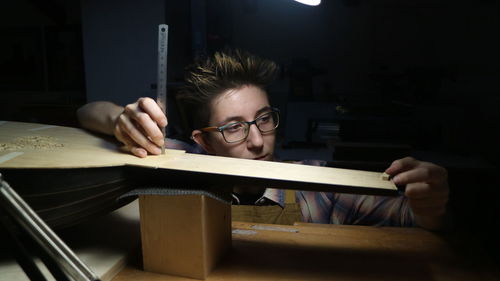 Young woman reading book