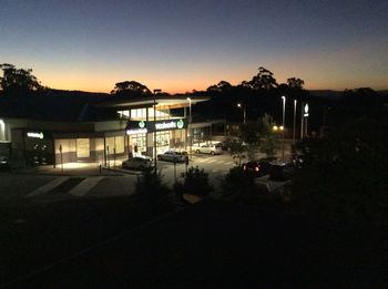 Buildings in city at night