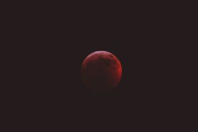 Scenic view of moon against sky at night