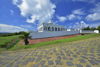 Building against cloudy sky