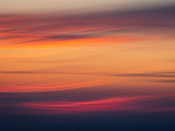 Scenic view of dramatic sky during sunset