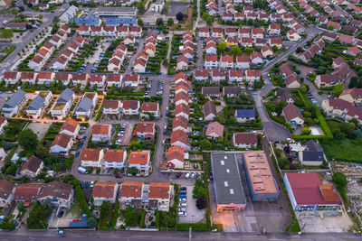 High angle view of street amidst buildings in town