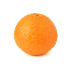 Close-up of orange apple against white background