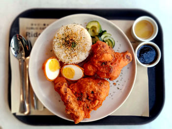 Top shot of fried chicken dish on tray