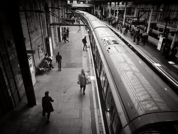 High angle view of people at railroad station platform