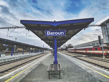 Train on railroad station platform against sky